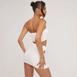 EGO Buckle Front Cut Out Detail Mini Skirt In Cream -Sperrryego Store 06 06 23 jul111566 s 1