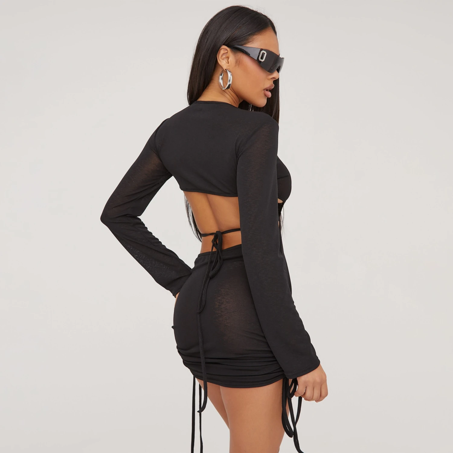 EGO Long Sleeve Cut Out Ruched Detail Mini Dress In Black Knit 6 EGO Long Sleeve Cut Out Ruched Detail Mini Dress In Black Knit - Image 4